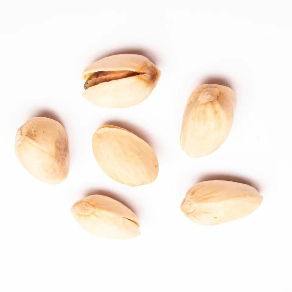 Pistachios on white